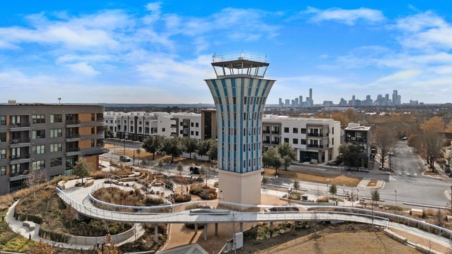 Kitchen with island seating in Unit 303