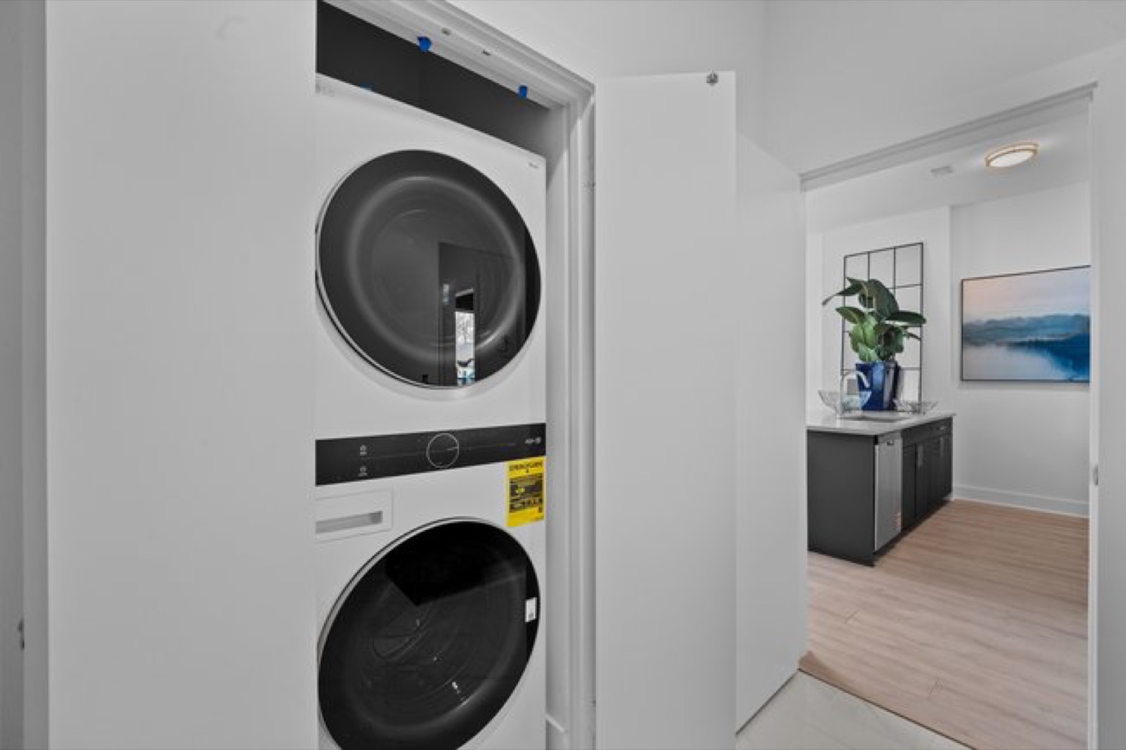 In-unit stacked washer and dryer