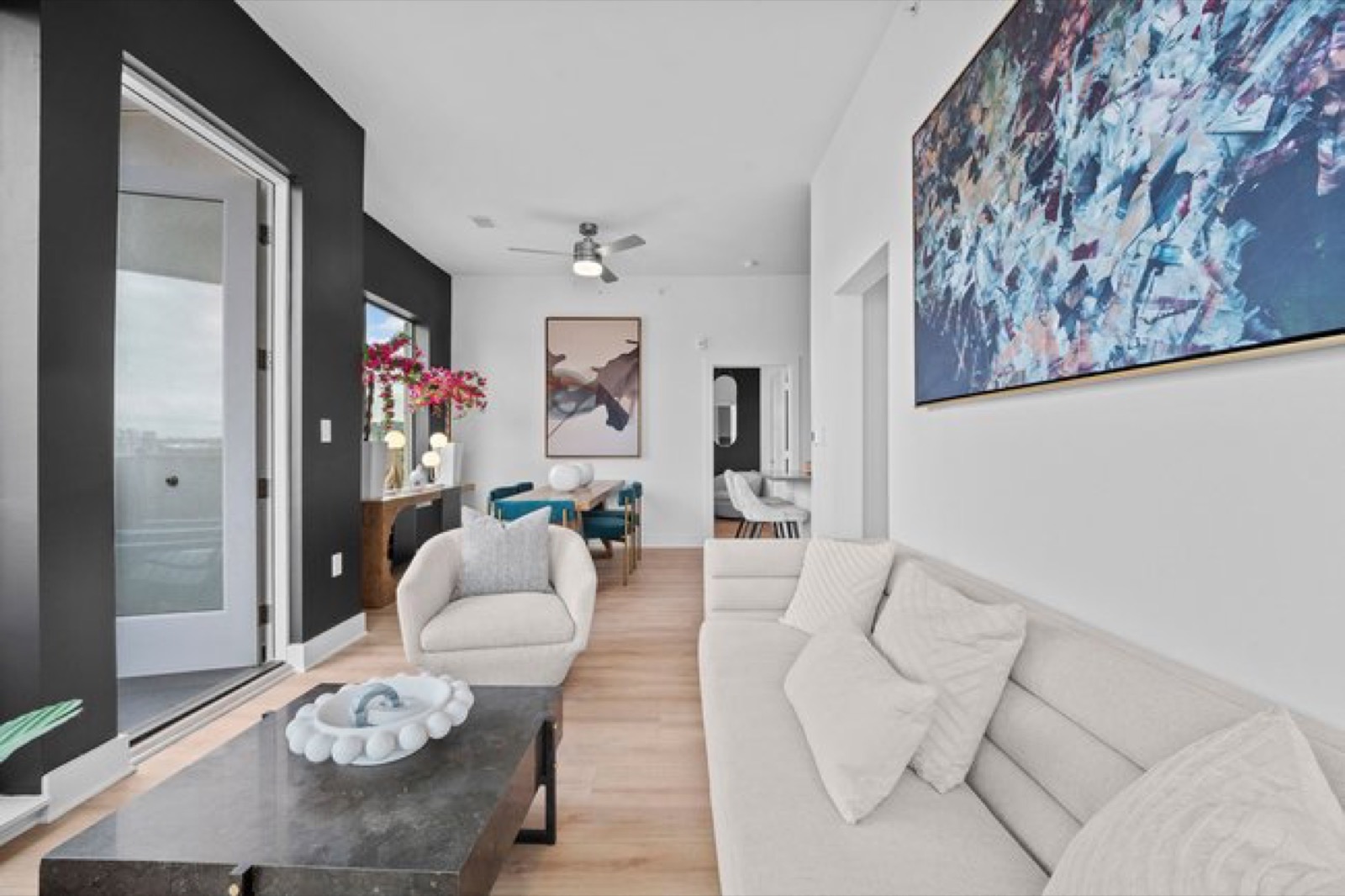 Living room with accent wall in Unit 303